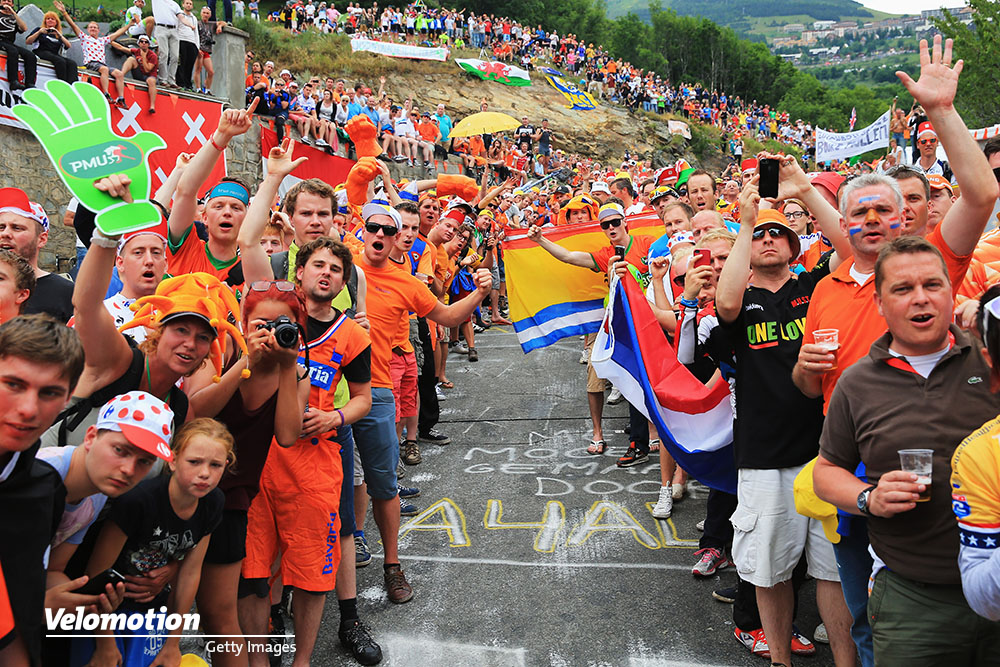 ALPE D'HUEZ, FRANCE - JULY 18:  Dutch fans line the road to the top of the Alpe d'Huez during stage eighteen of the 2013 Tour de France, a 172.5KM road stage from Gap to l'Alpe d'Huez, on July 18, 2013 in Alpe d'Huez, France.  (Photo by Doug Pensinger/Getty Images)